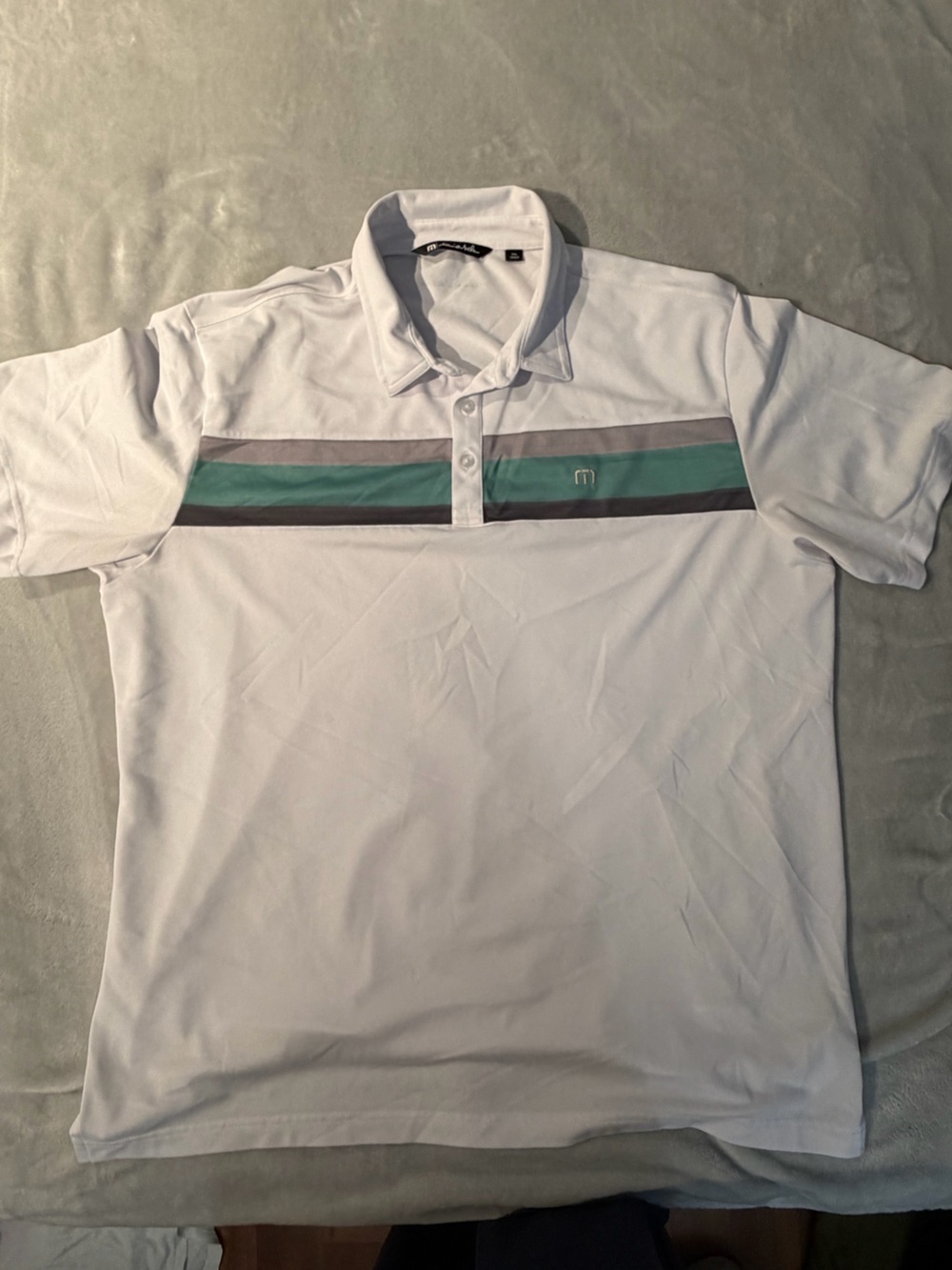 Travis Mathew White Polo with Green and Gray Chest Stripes